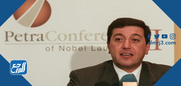 من هو باسم عوض الله ويكيبيديا