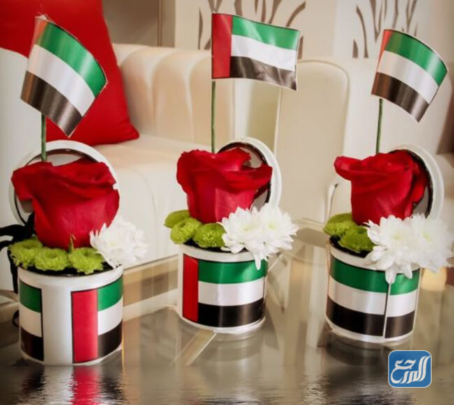 صور توزيعات يوم العلم الإماراتي