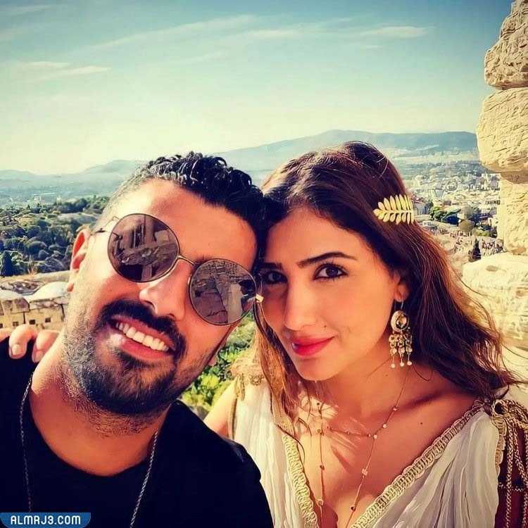 صور مي عمر وزوجها