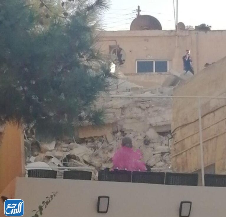 صور انهيار مبنى اللويبدة في عمان 