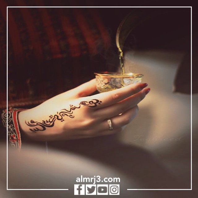 صور يد ماسكه فنجان قهوة عربية