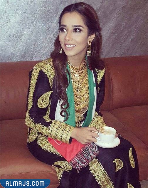 تصاميم فساتين سهرة وعباءات بألوان العلم الإماراتي بالصور