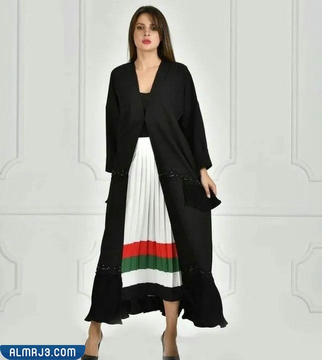 تصاميم فساتين سهرة وعباءات بألوان العلم الإماراتي بالصور